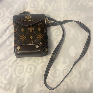 Small over the shoulder purse.